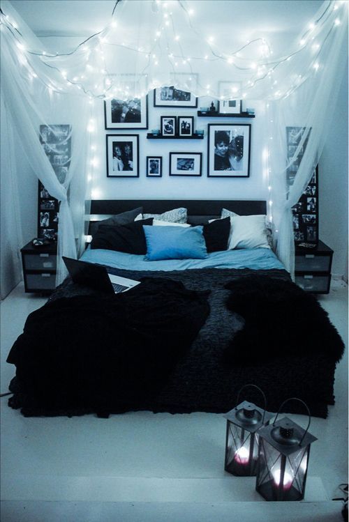 an airy sheer bed canopy with string lights creates a magical feel and a cozy ambience