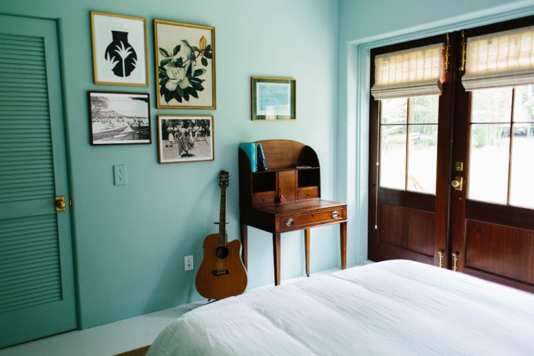 This bedroom is done in turquoise to remind of the ocean, and the artworks are mid century modern ones This bedroom is done in turquoise to remind of the ocean, and the artworks are mid-century modern ones