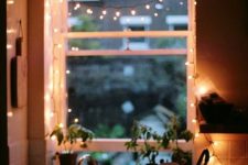 07 hanging string lights in the window will make the space cozier from inside and outside, too