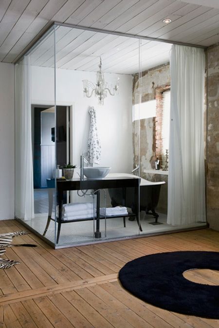 an elegant bathroom that can be hidden behind the curtains for privacy