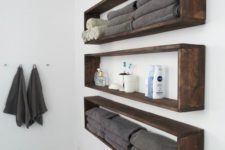 09 dark wooden box shelves for a contemporary bathroom