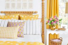 10 bold yellow curtains, polka dot pillows and a matching bedspread for a springy bedroom