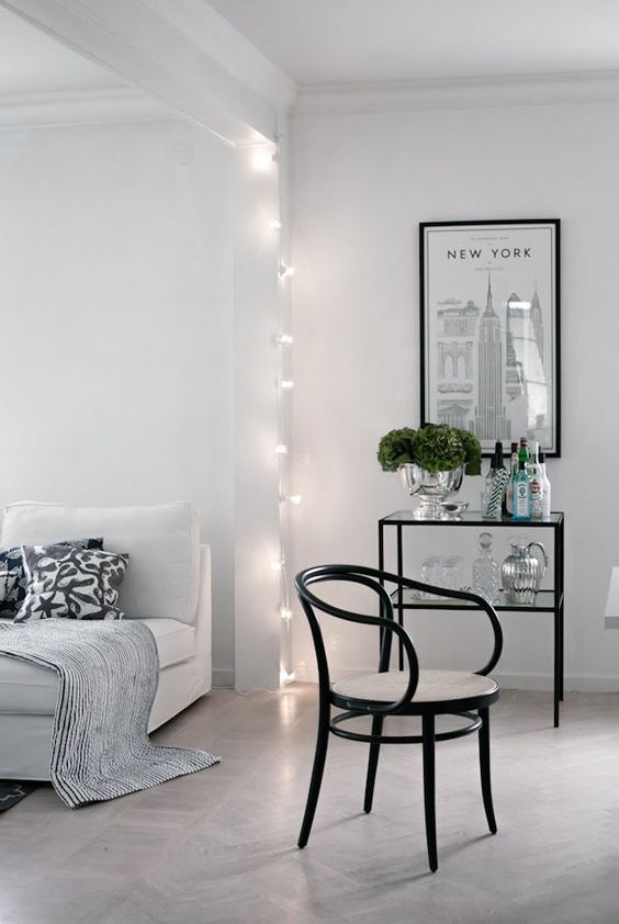 separate the living space form the rest of the room hanging string lights
