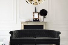 21 a modern glam space with a fresh and refined take on a classic Chesterfield