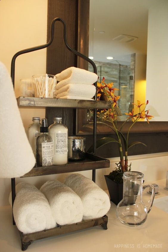 a reclaimed wood and metal organizer to place on a vanity or next to a bathtub