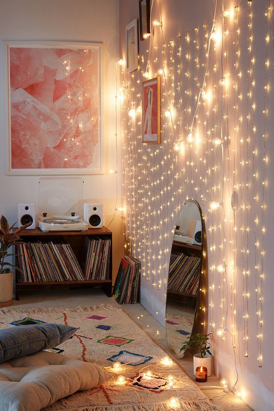 cover a whole wall with string lights to accent a nook, a space or some corner