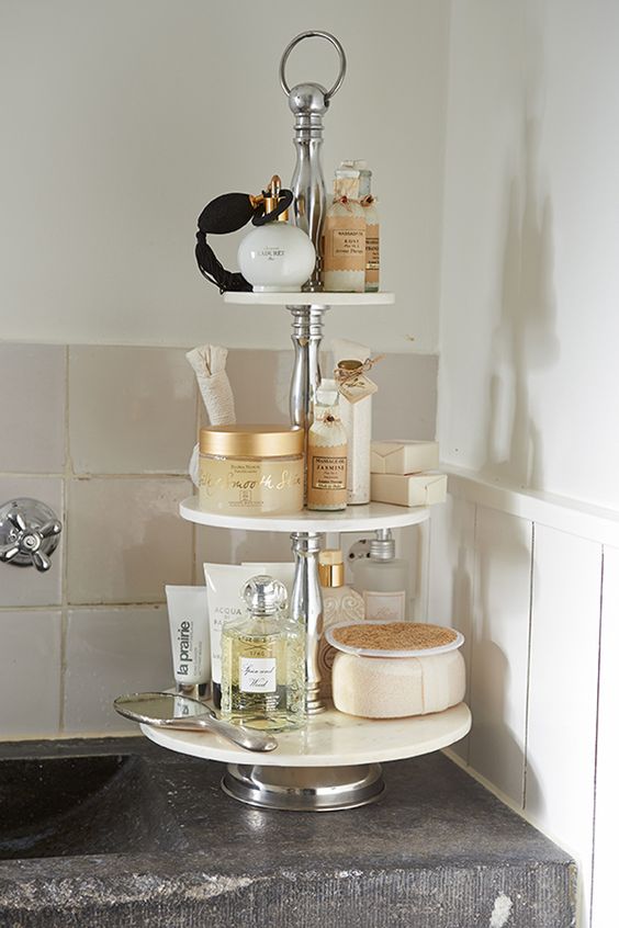 a chic rounded etagere as an elegant bathroom organizer