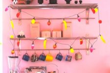 24 fun vintage fruity string lights on a shelf add a whimsy touch and a fun feel to this colorful kitchen
