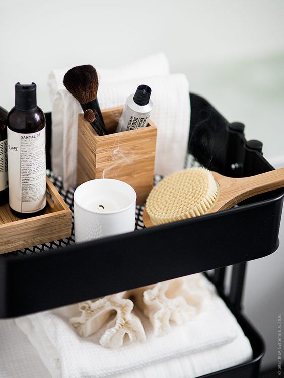 an IKEA Raskog kitchen cart can be updated to fit your bathroom as an organizer
