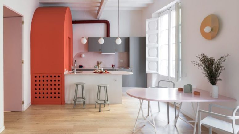 This colorful apartment is located in Barcelona and features interesting solutions and color blocking with a retro feel This colorful apartment is located in Barcelona and features interesting solutions and color blocking with a retro feel