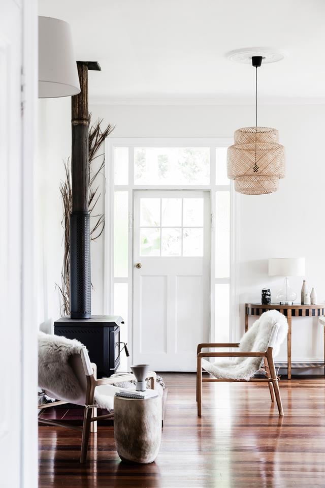 This is a sitting zone with a hearth, pampas grass, vintage furniture and textural touches here and there to make it interesting