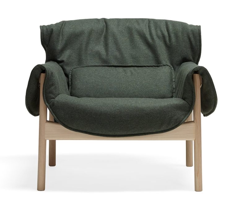 chair with nice upholstery The piece is made of a reclaimed wooden frame and fabric or leather upholstery for a stylish and cozy look