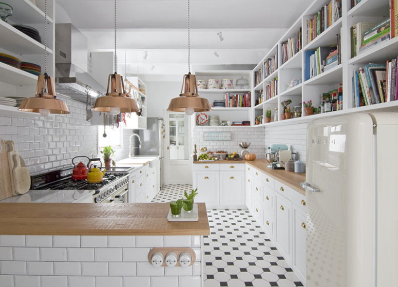 Large and long shelves take two walls, and some colorful touches enliven the kitchen