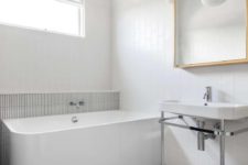 simple bathroom design with a free-standing bathtub