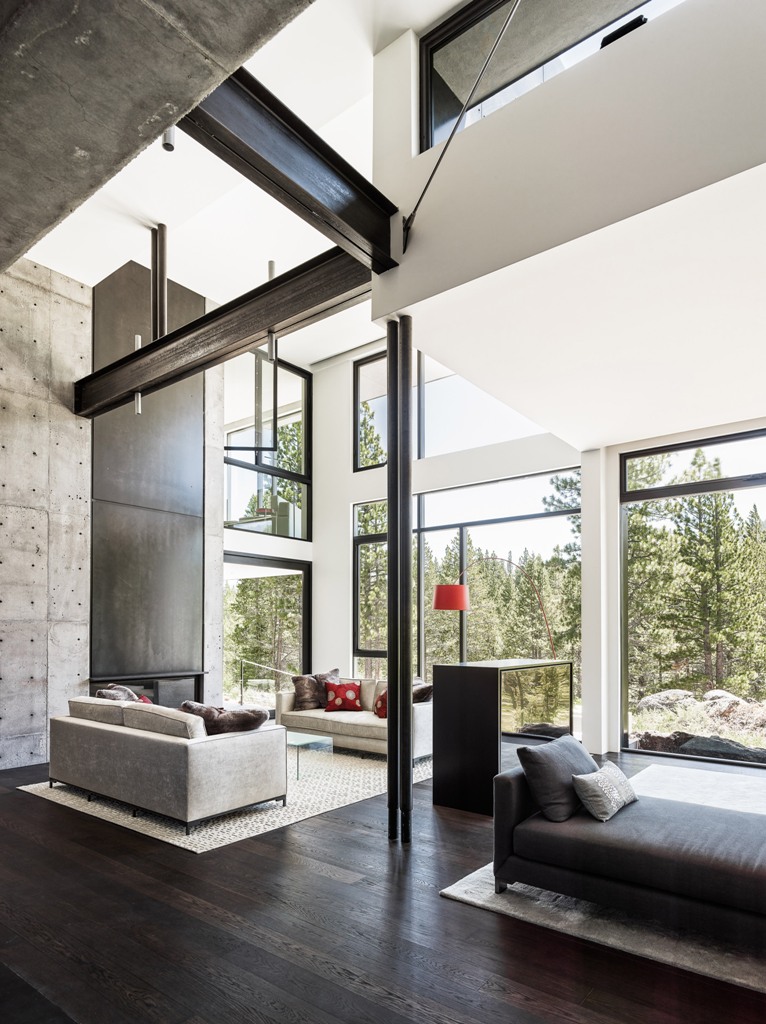 The decor is done with contemporary furniture in creamy, grey and black, and there are some bright touches, for example, red pillows The decor is done with contemporary furniture in creamy, grey and black, and there are some bright touches, for example, red pillows