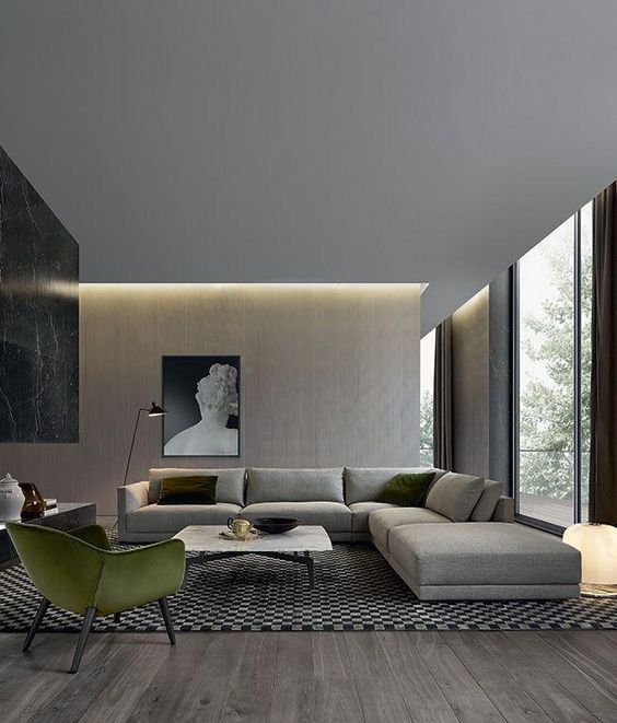 a dove grey L-shaped sectional sofa is the base of the room creating the conversation zone