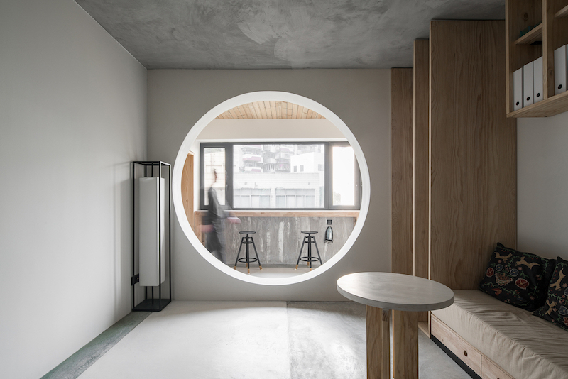 A circular opening adds to the design and brings more light in than a regular glass door