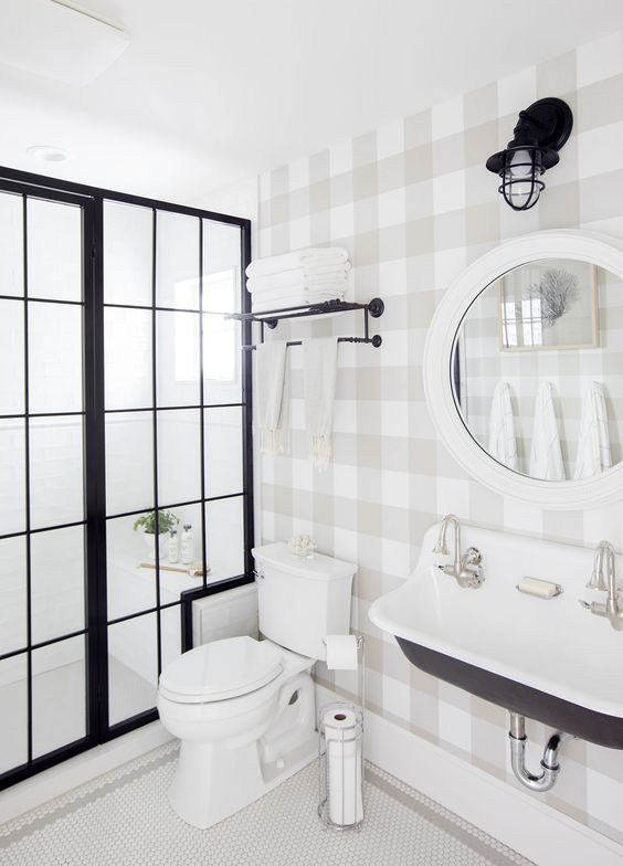 a light grey and white buffalo check wallpaper for decorating a vintage bathroom