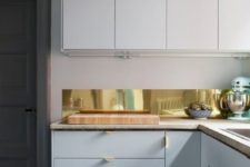 05 a narrow polished gold kitchen backsplash to add interesting to a plain white kitchen