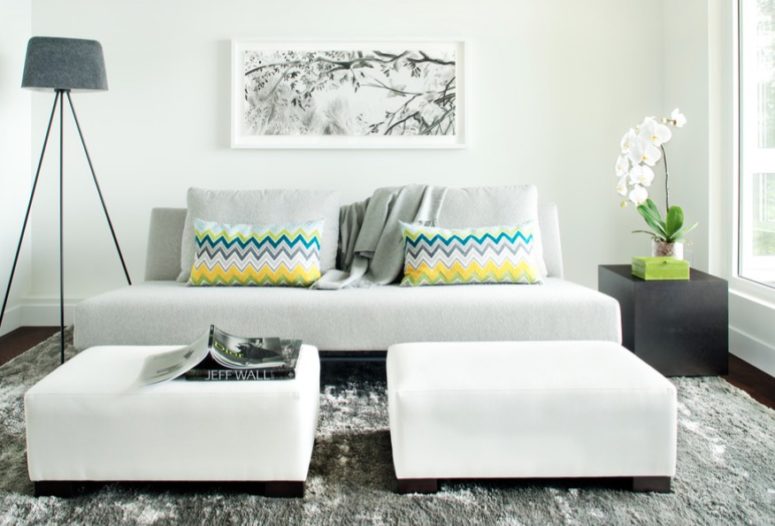 large ottomans in a luxurious creamy shade make the space bold and chic