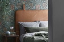 05 vintage-inspired floral print wallpaper and a leather headboard are an ideal combo for a moody space