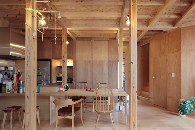 warm wood clad interior Everything is clad with wood, there are bulbs instead of lamps and the furniture is wooden, too