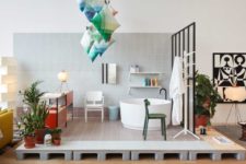 07 The bathroom is open, with colorful pillows installation over it and modern appliances