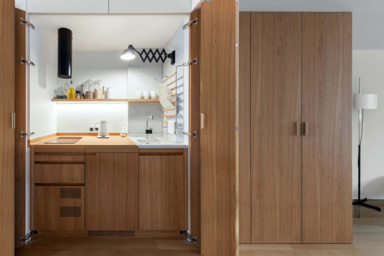 practical small kitchen design There's a tiny kitchen hidden on the left part of this unit