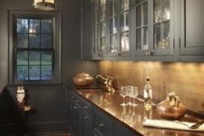 07 a vintage grey kitchen with a polished metal backsplash and a matching countertop