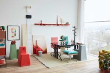 The home office nook is also a double one, with colorful furniture and artworks for a gorgeous look