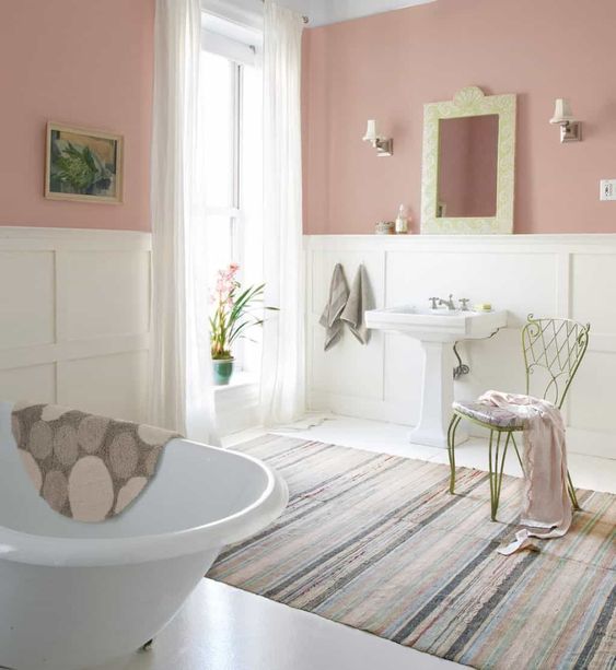 wainscoting is ideal for a girlish vintage bathroom to add chic and a refined feel