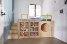 09 The kids’ room is done with a large unit comprising storage, a play space and a bed on top