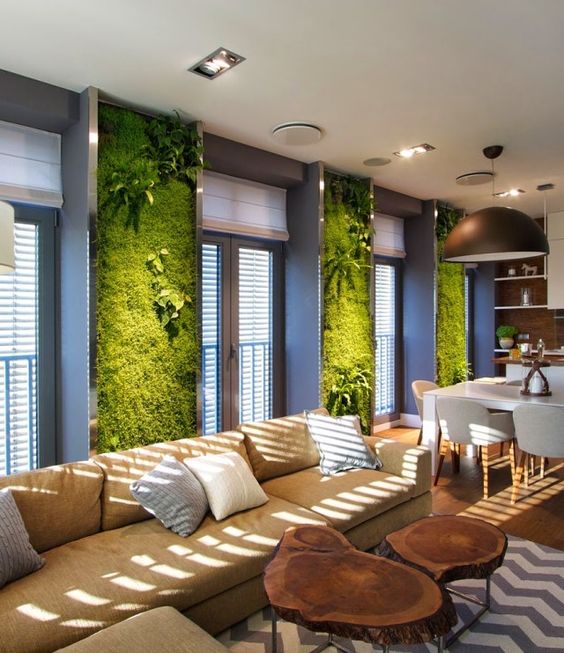 moss and fern walls in the open layout create a chic look and make it fresh