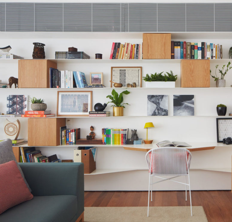 thoughtful home office wall storage This shelving comprises a home office or reading nook, which is perfectly integrated into decor