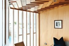 10 a catchy and sculptural wood chevron ceiling adds to this mid-century modern space