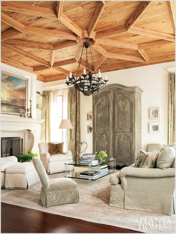 a breathtaking coffered ceiling makes a bold statement and adds a refined feel to the space
