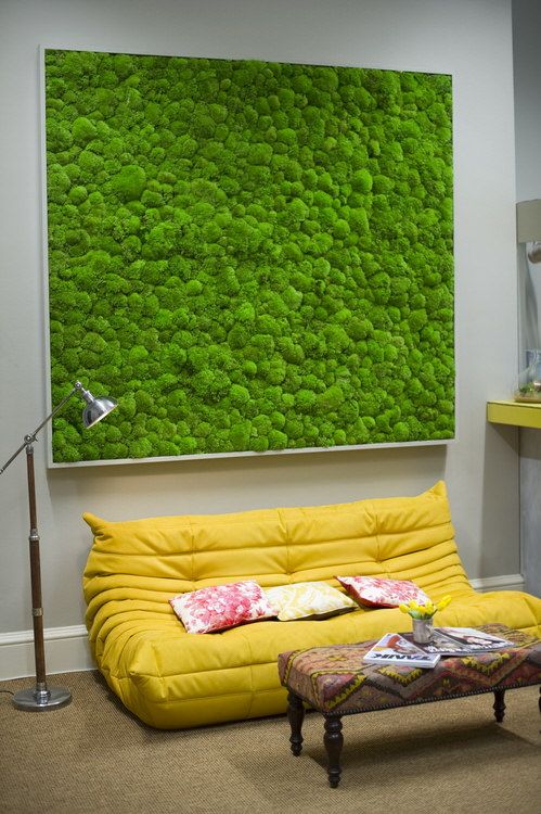 an oversized green moss wall art is a perfect fit for a modern living space