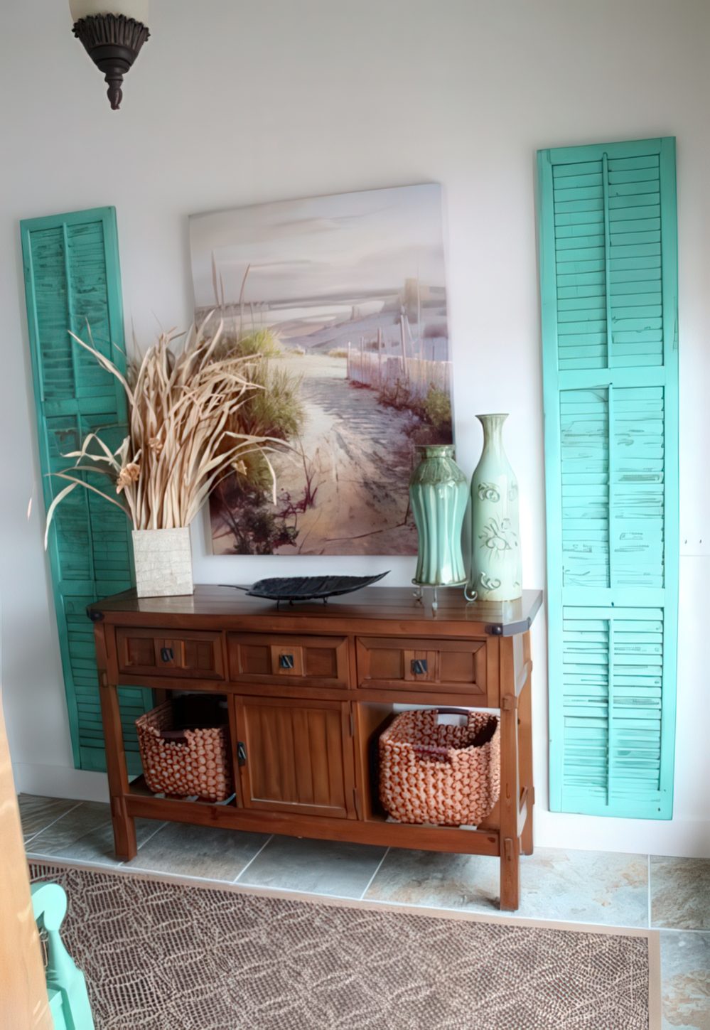 bold turquoise shutters on both sides of a console bring a beach feel to the space