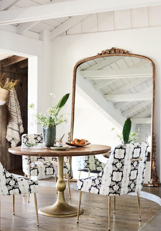 accent your space with an oversized vintage mirror and it will reflect the light