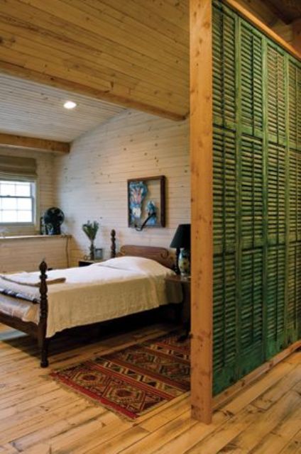 separate the spaces in the open layout with a shutter wall or even sliding shutter doors