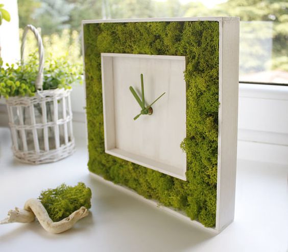 a stylish moss framed clock is a great idea for a modern space, it will refresh the space