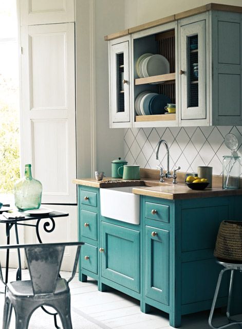 two-toned free-standing kitchen cabinets comprise two of the hottest kitchen decor trends in one