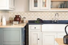 vintage creamy and grey freestanding kitchen cabinets for a contrasting and bold space