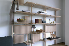 01 GATE is a highly adaptable shelving unit that features much storage space, which can be changed anytime