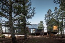 01 This rustic cabin duo is located on a remote site in the forest and features minimal impact on the nature