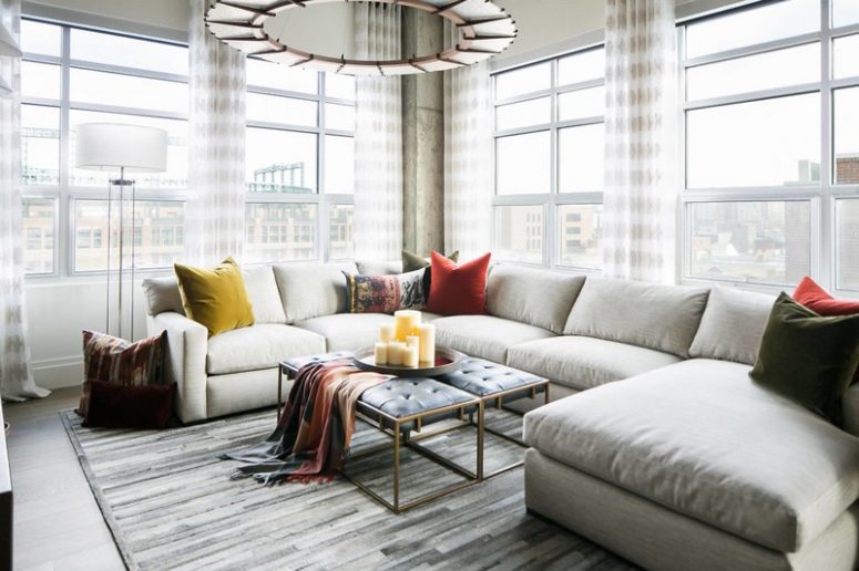 Large windows bring much light inside, and a large corner sofa with a double upholstered bench creates a cozy space Large windows bring much light inside, and a large corner sofa with a double upholstered bench creates a cozy space