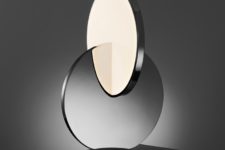 02 Tidal is a table lamp formed from polished chrome and acrylic with LED lights