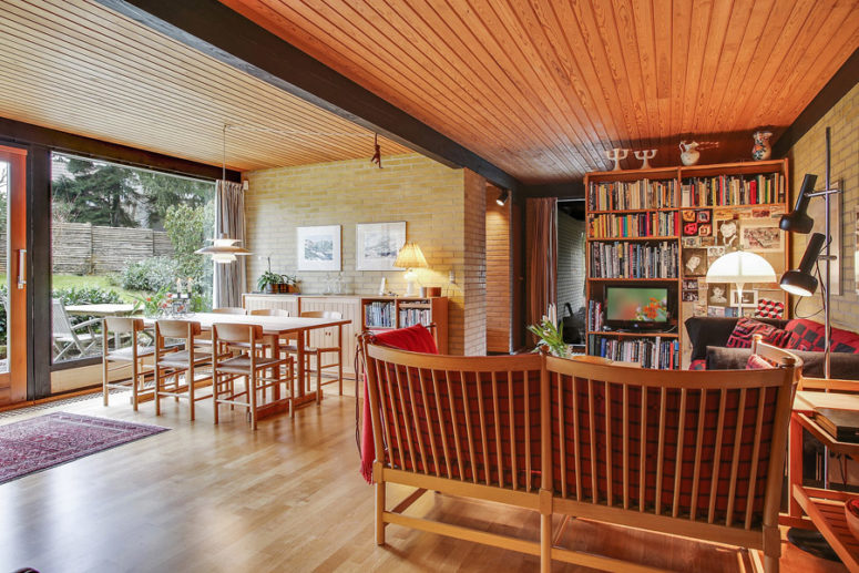 The dining space is united with the first living space, a glazed wall brings light inside and features the views The dining space is united with the first living space, a glazed wall brings light inside and features the views