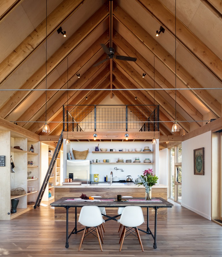 There's much plywood in decor, and the gabled roofs are highlighted with beams and lights