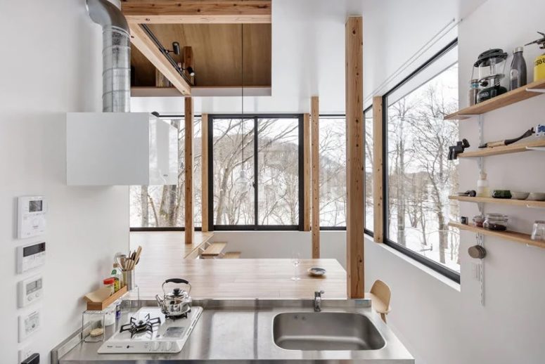 Some shelves and a small cooking top are available in the kitchen